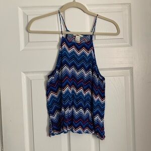 Tank with really pretty blues and pinks and white colors. Size small